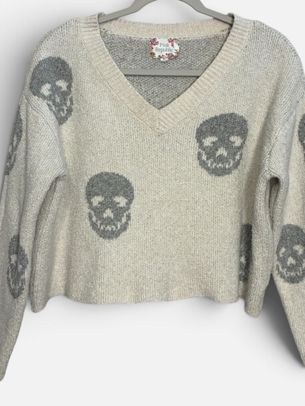 Pink Republic Cream V-Neck Sweater with Gray Skull Motifs